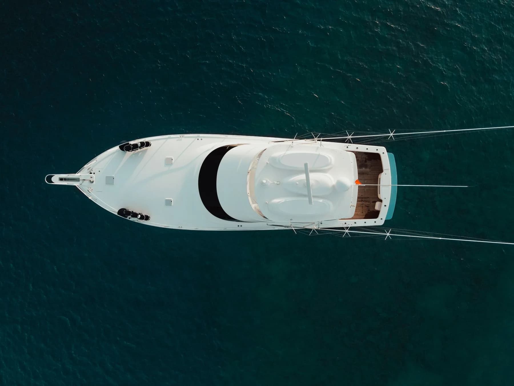 A yacht cruising in clear Mediterranean water